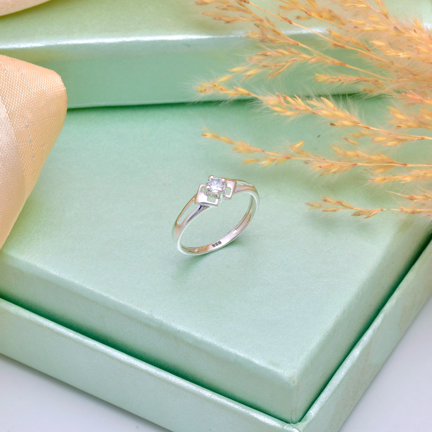 Minimalist Silver Ring with Solitaire Design